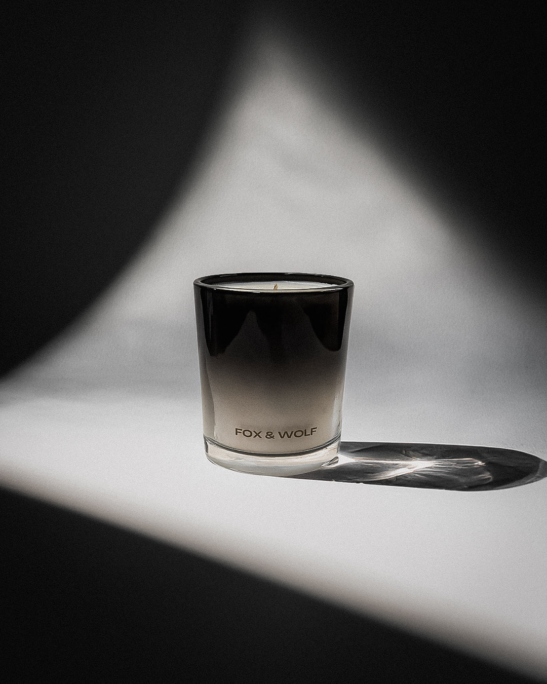 Luxury scented candle in black glass jar by FOX & WOLF